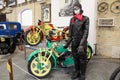 Museum of transport - historical bicycle and a figurine in vintage clothes representing a biker